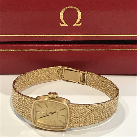 rare omega ladies gold watch.